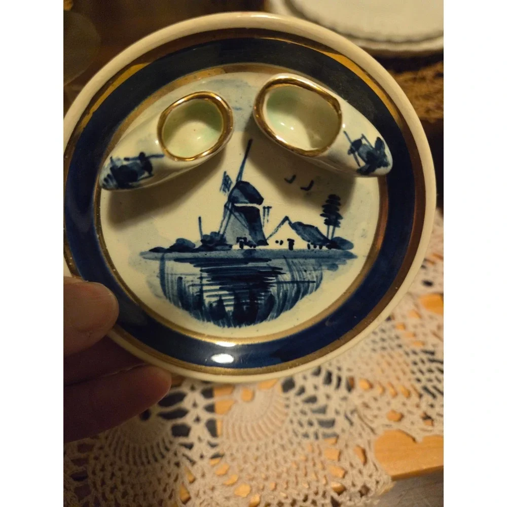 delft blue hand painted holland plate With Little Shoes Attached.